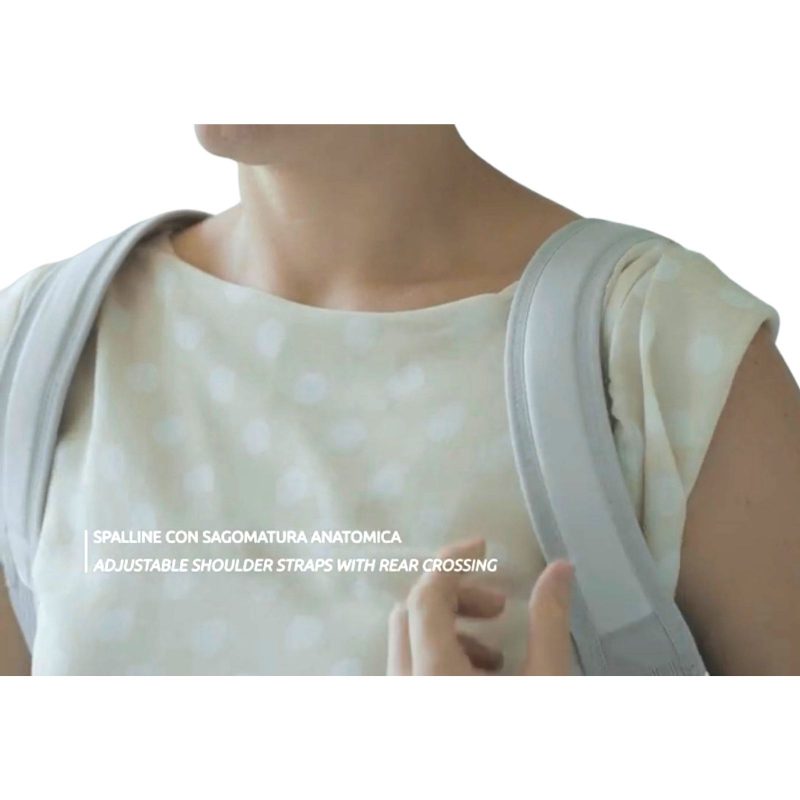 Woman with posture corrector adjusting strap